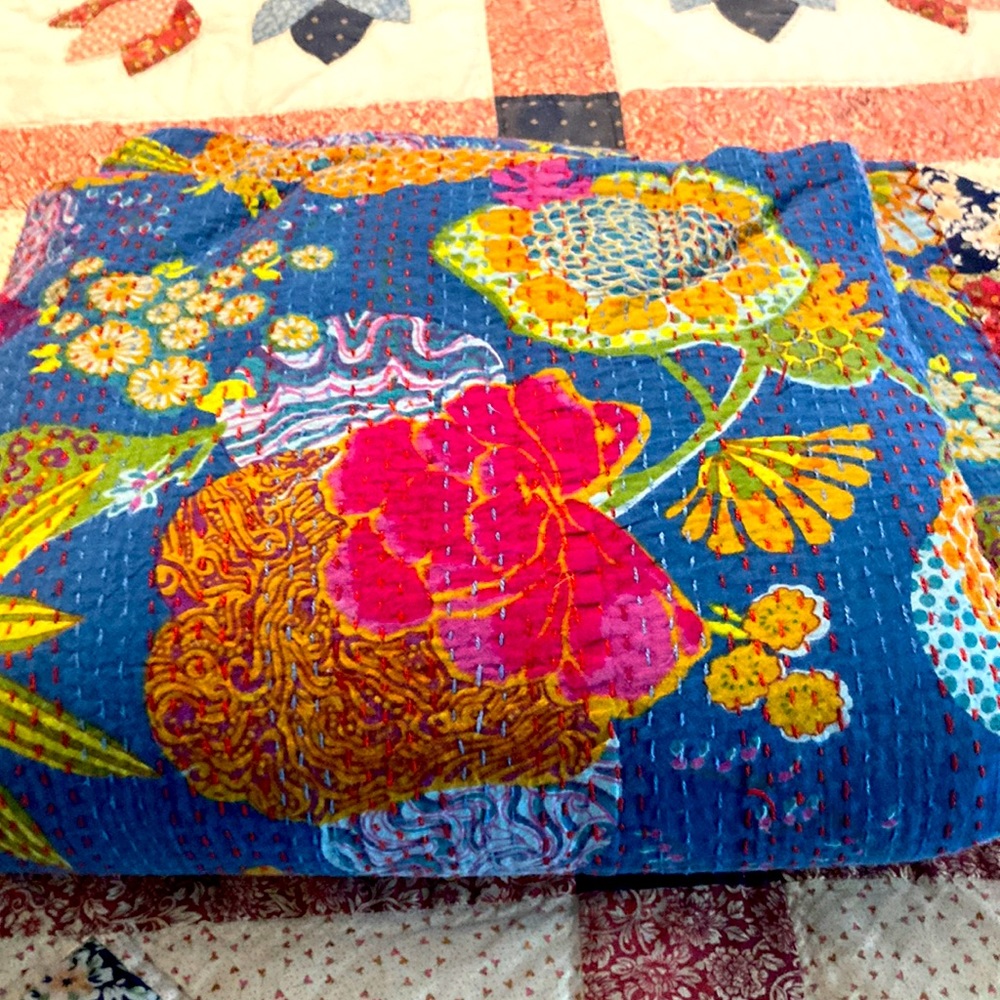 120” x 110” homemade multicolored quilt for a king size bed. Not padded
